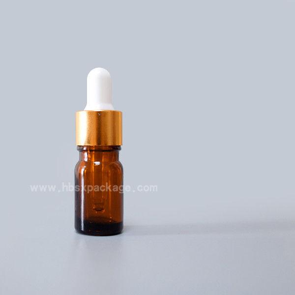 trade assurance 5ml clear glass essential oil bottle with pipette dropper and a white band and a white top